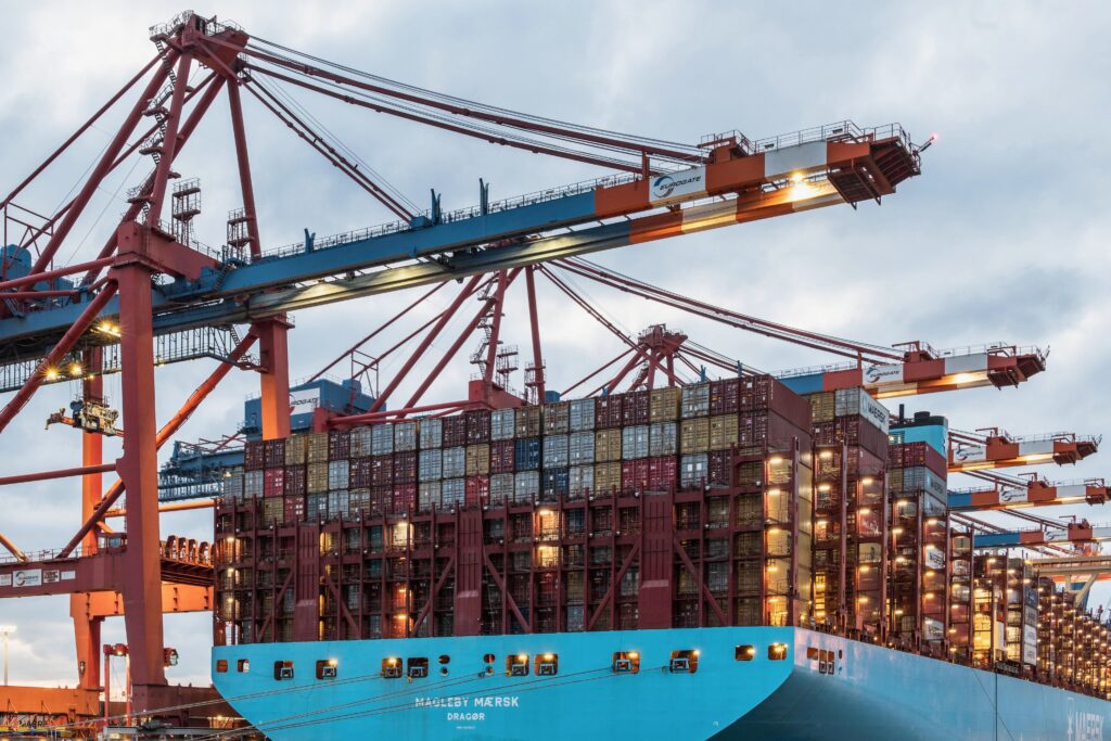 pexels photo 20581299 20581299 A cargo ship loaded with containers at Hamburg's bustling commercial dock.
